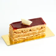 portioned-layered-cake-topped-with-cherry-glaze-min_1